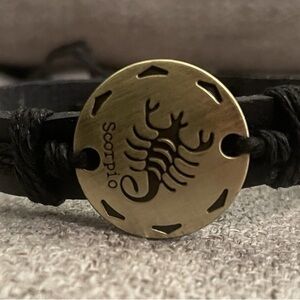 Women’s Black Leather Bracelet with Brass Scorpio Disc